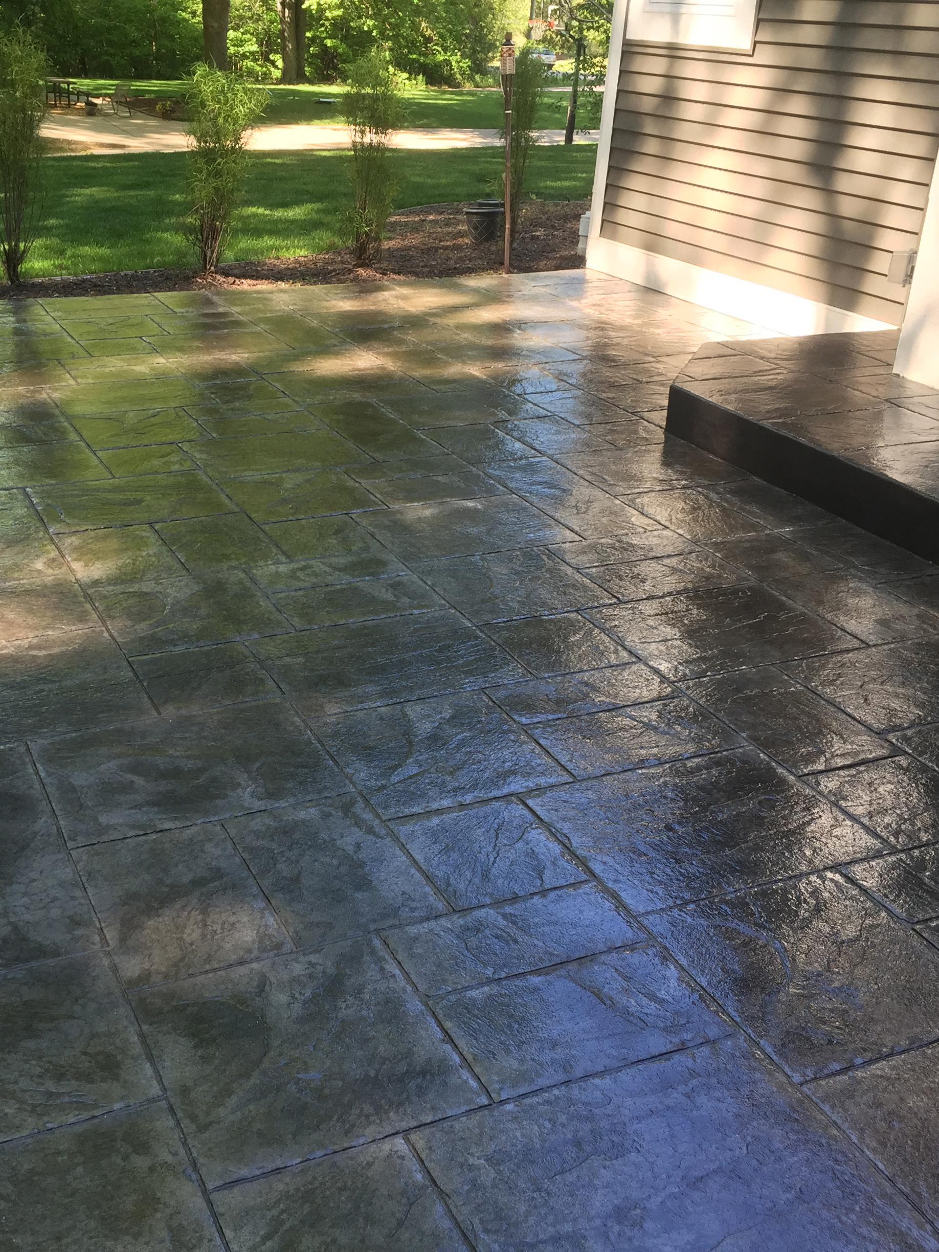 Custom stone stamped and colored concrete patios by UIS Concrete Contractors in Grand Rapids MI - uisconcretegr.com